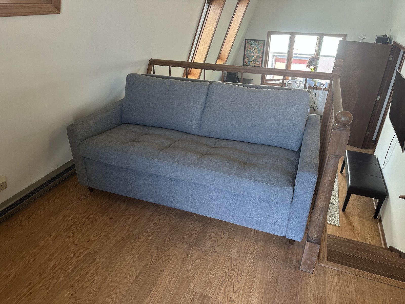 angled view of mcm sofa bed